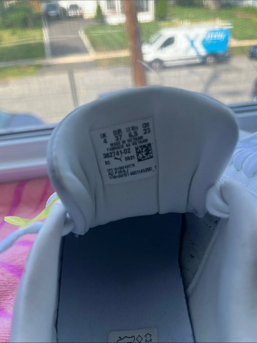 Puma Kids White Sneakers with Neon Yellow and Orange Accents
